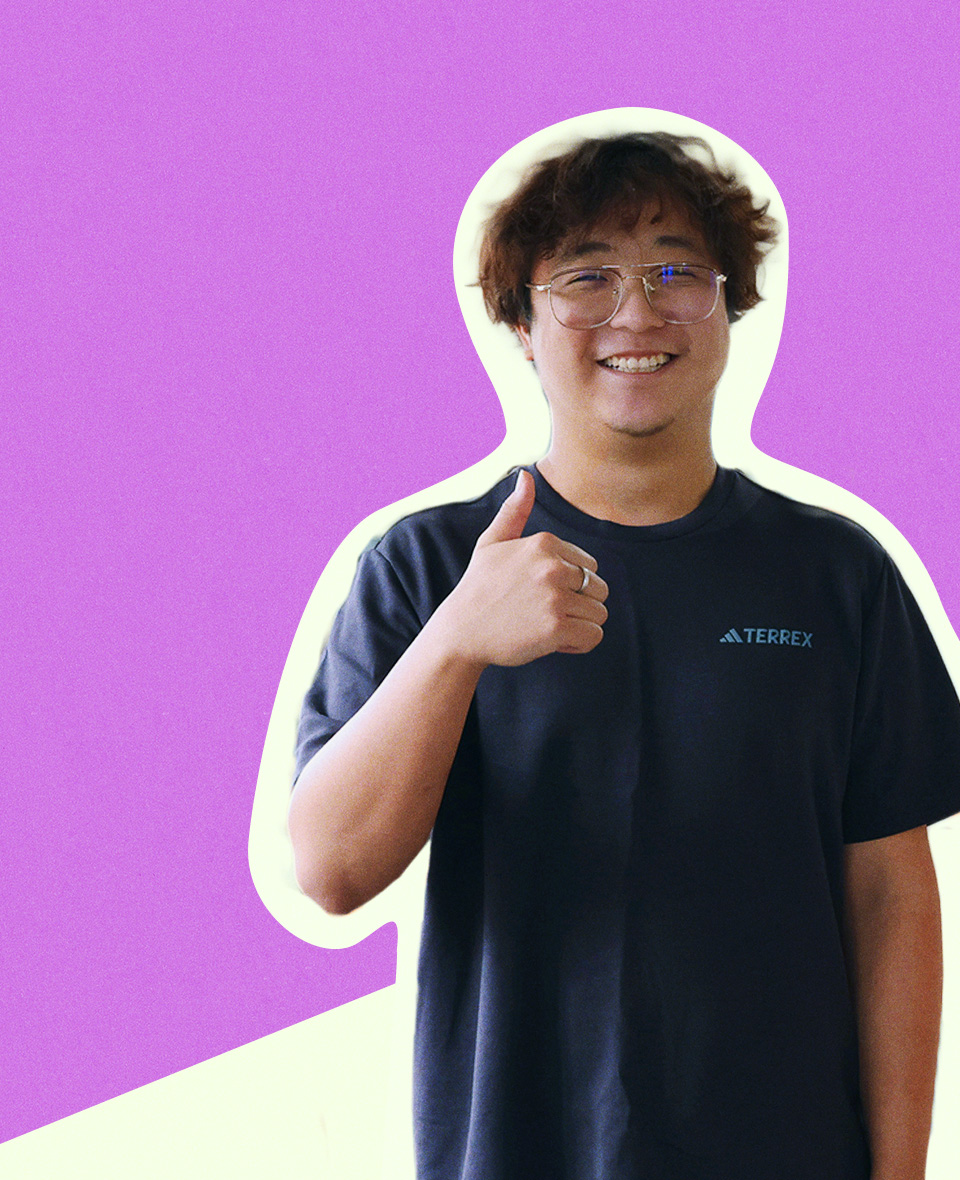 Yu Cheng_School of Arts, Science and Technology Student posing for his testimonial