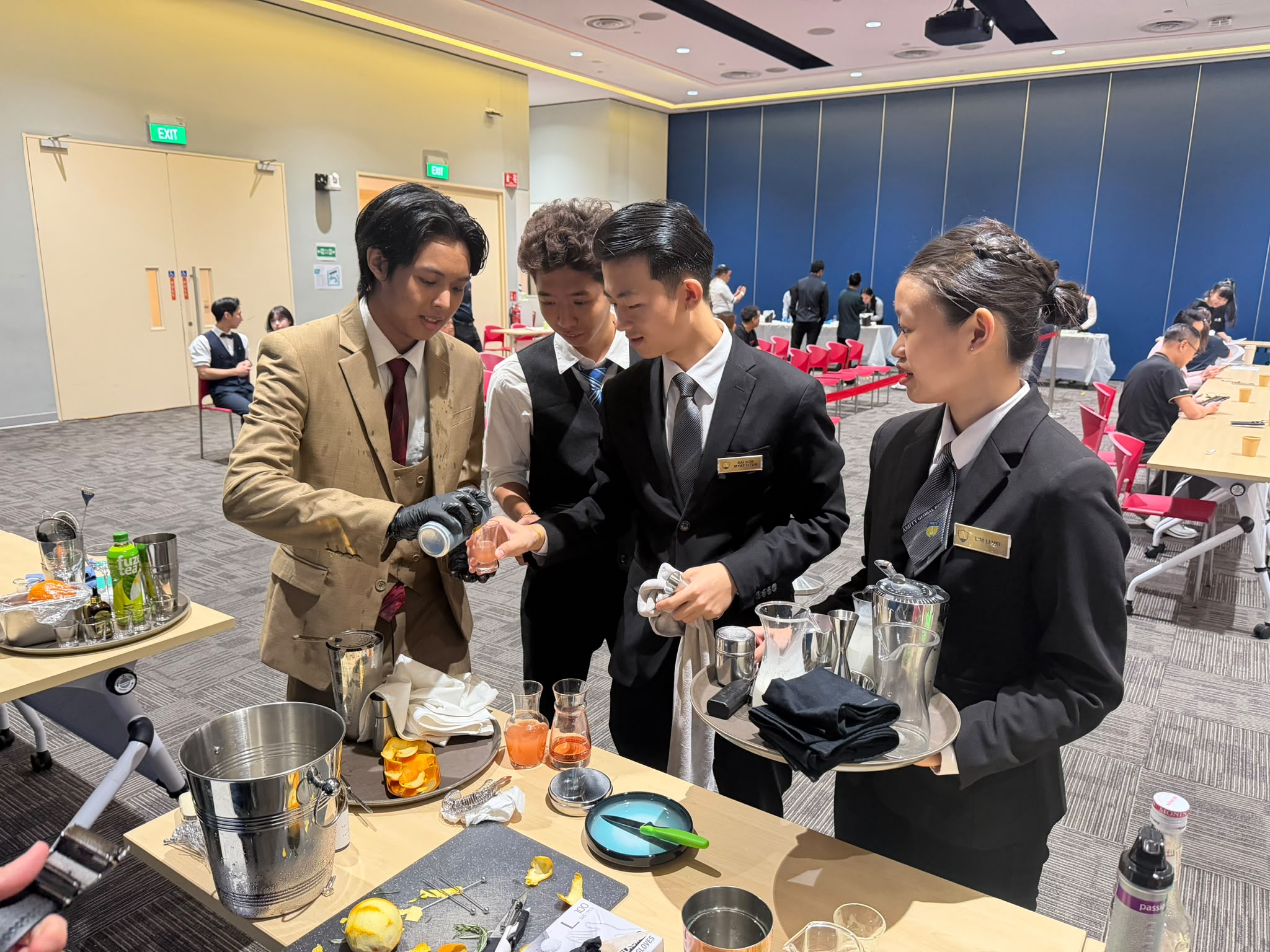 Win Oo sharing his signature cocktail with new friends