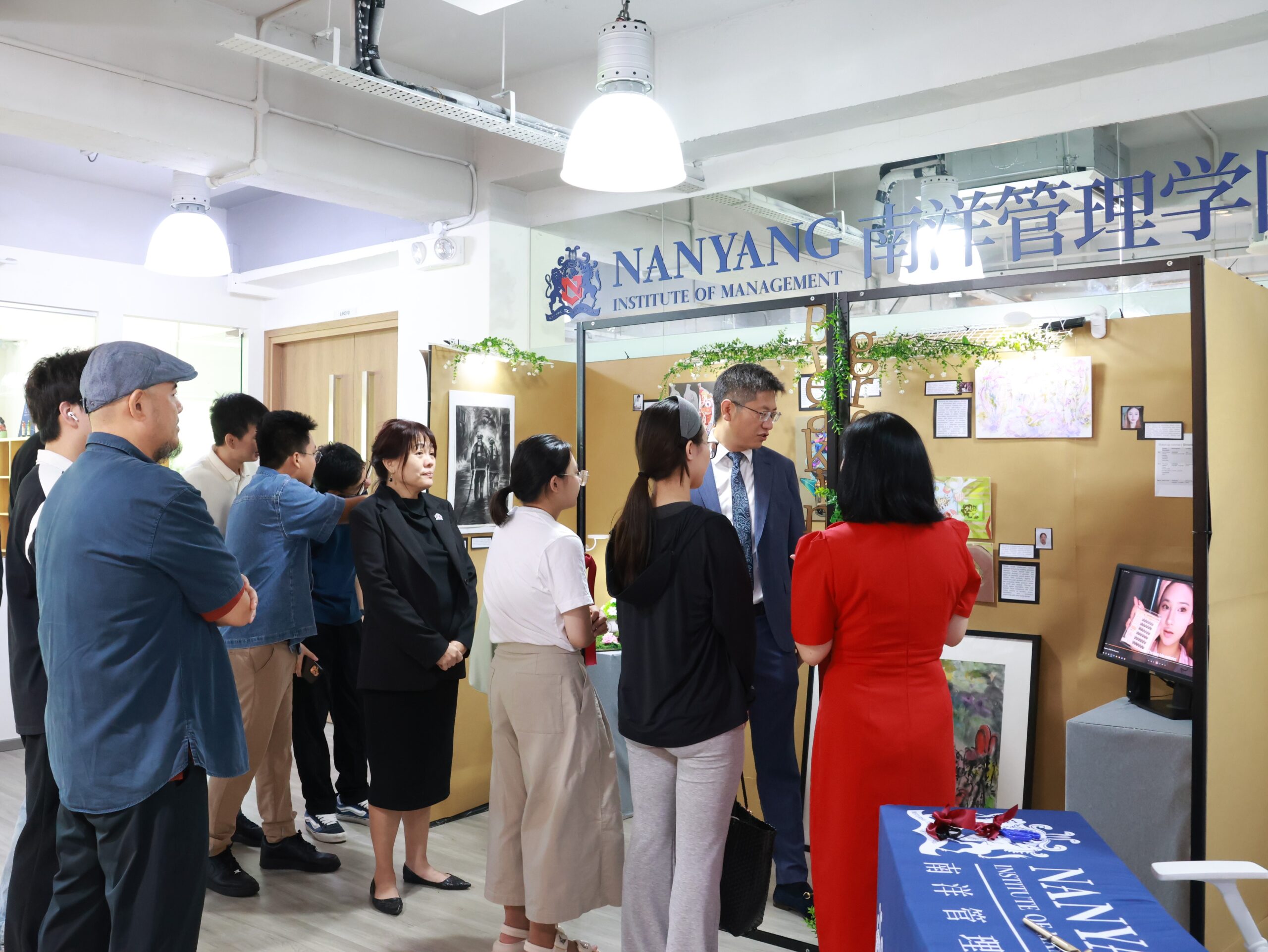 Guests admiring Student Artworks