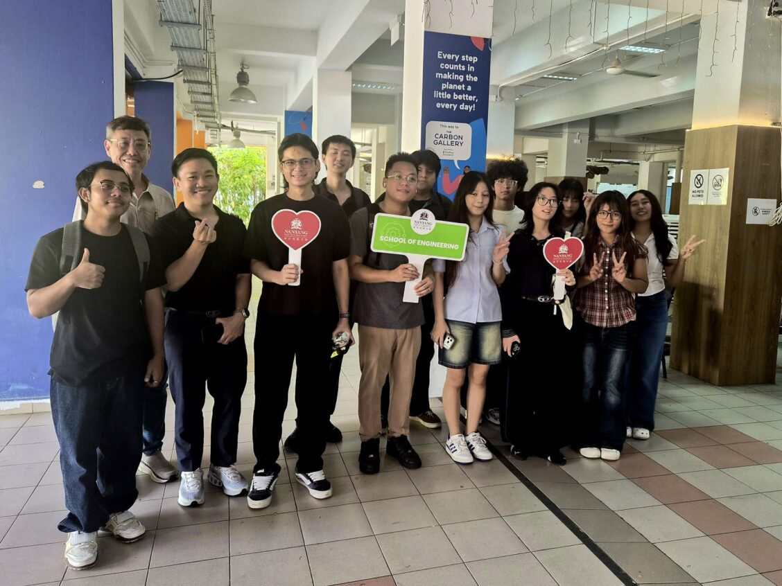 NIM SENG Students pose at The Carbon Footprint